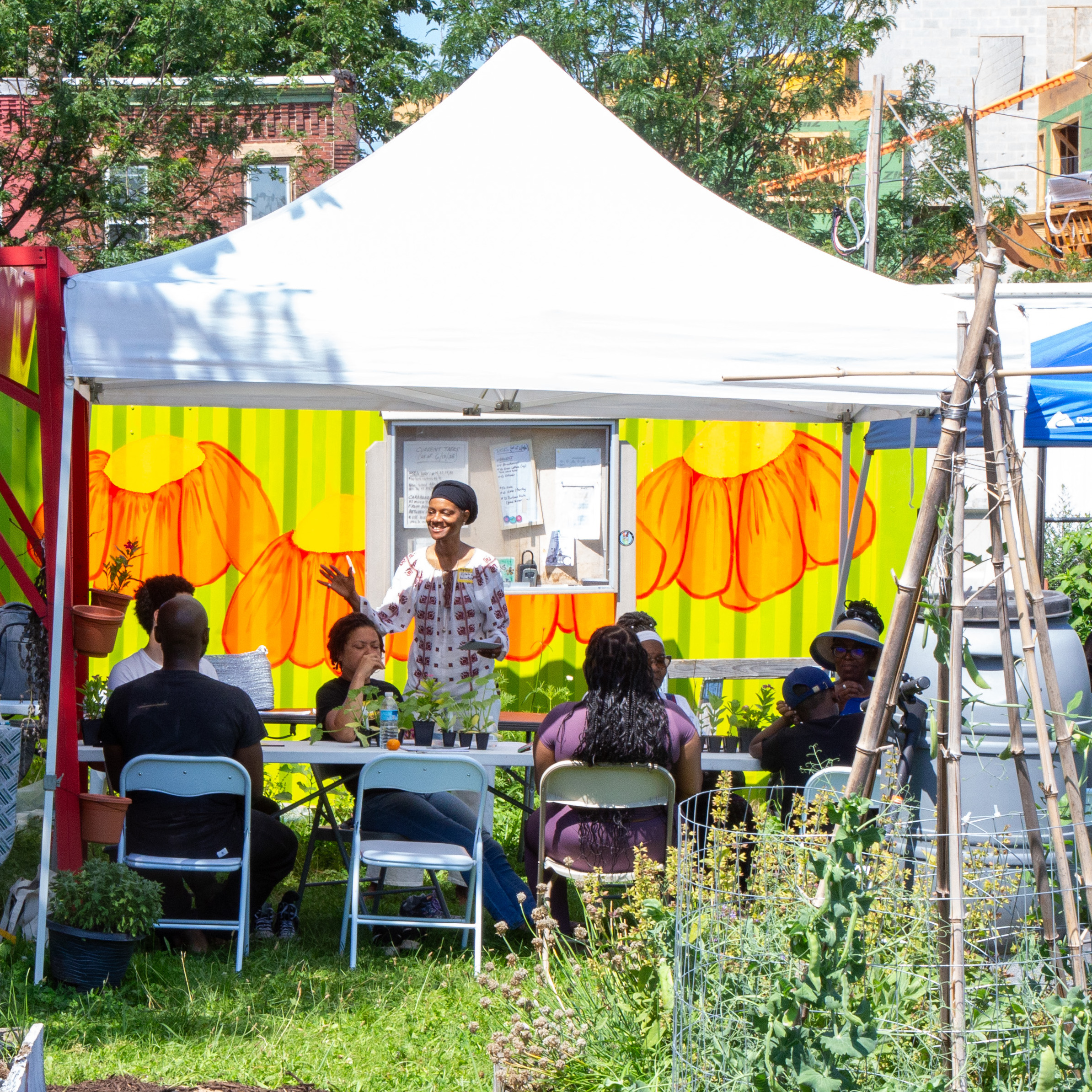 Michelle ("MB") conducting workshop at a community farm in Philadelphia, PA